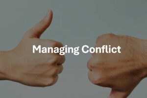 Imaging of thumbs up and down to represent managing conflict